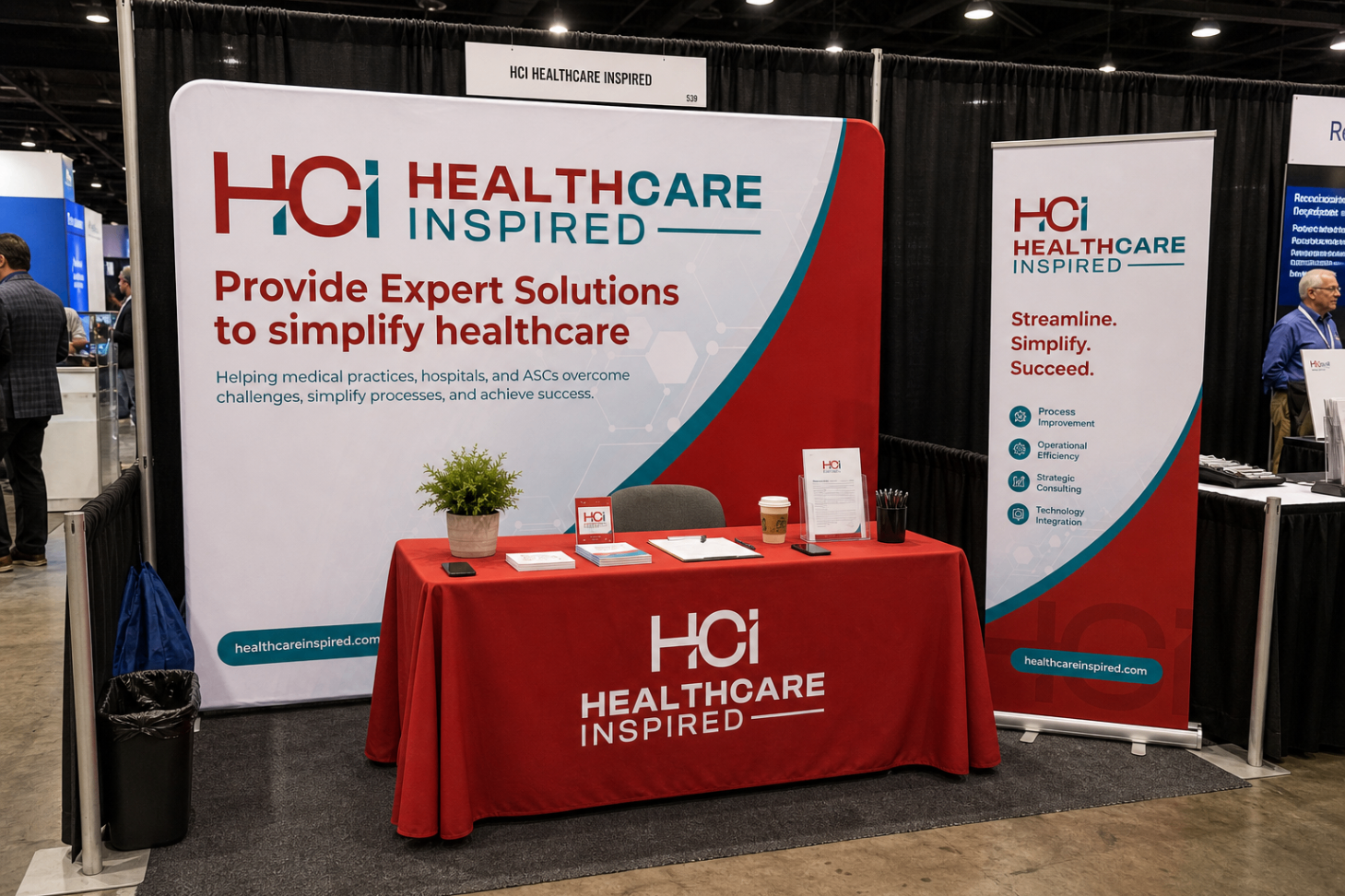 Healthcare Inspired booth with red and white tradeshow backdrop and matching table throw.